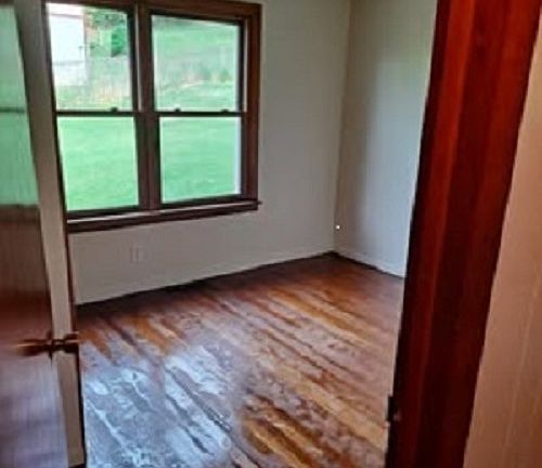 smaller bedroom down stairs, to the right going down hallway