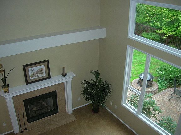 Upstairs area has opening to lower family room