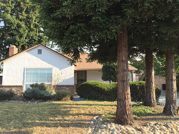 the main house with trees