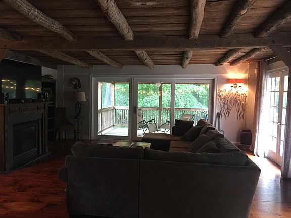 Great room with gas fireplace.
Sliding door to screened porch.
Double French doors to deckGas Fireplace