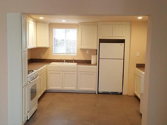 New kitchen cabinets, sink,