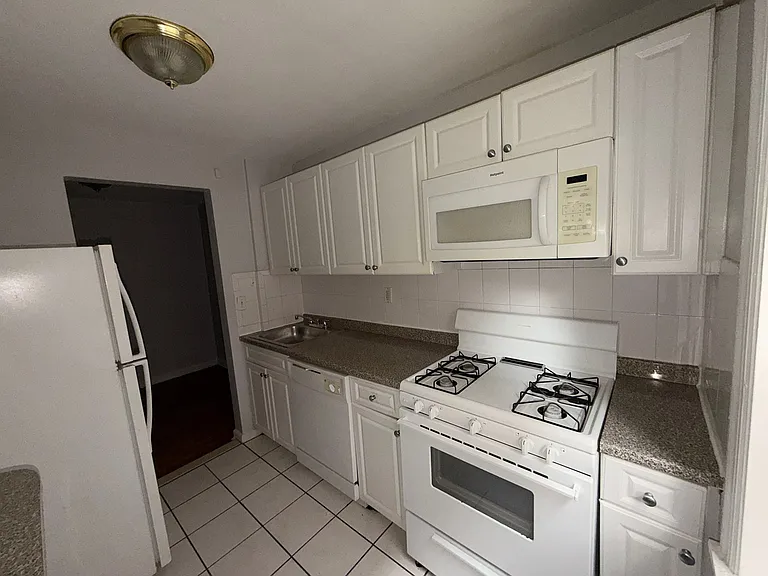 6115 John F Kennedy Blvd E #21E — Photo 1