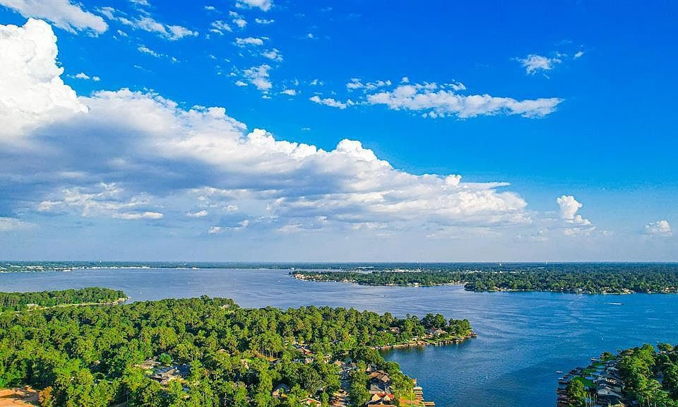 Image 1: WOW! Feel like you are on vacation every day! Look at this shot from right above YOUR HOME! This could be where YOU LIVE!