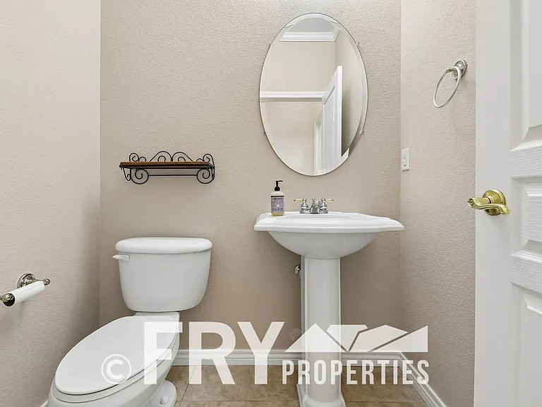 12975 W 77th Dr — Photo 21