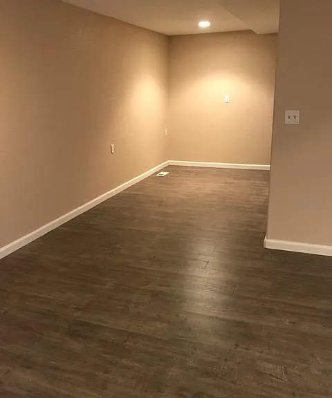 Lower level additional storage/non conforming bedroom.