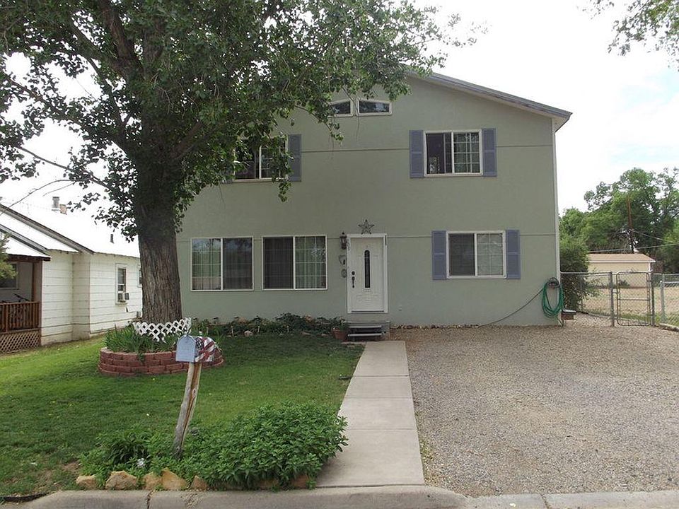 Front of house with parking