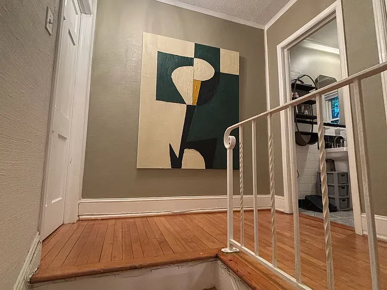 Up the stairs to the 2 bedrooms and bath.
