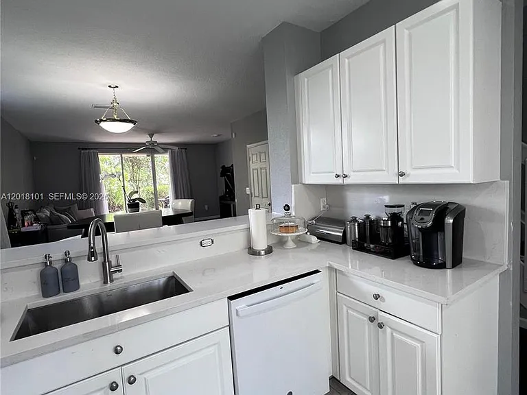 681 NW 42nd Ave #- — Photo 1