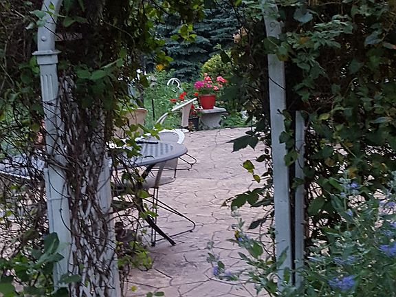 Arbor leading to patio