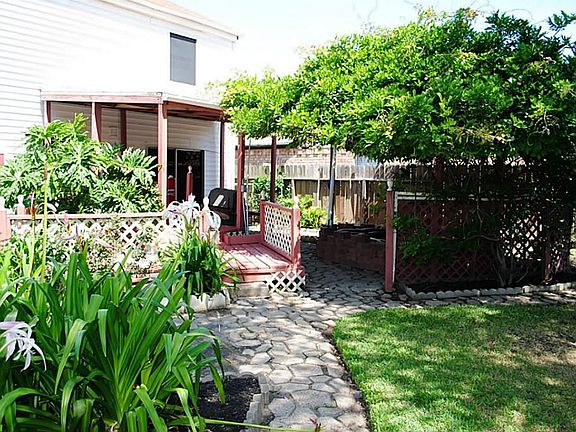 A look at the beautifully landscaped backyard.