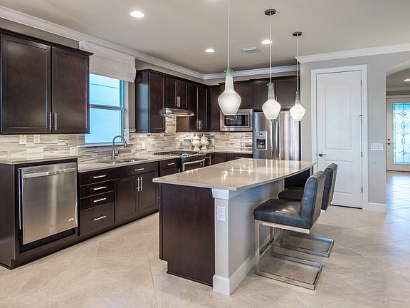 Model Representation Kitchen with center island and stainless steel appliances
