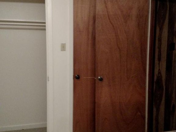 Partial view if Master Bedroom, his and her closets