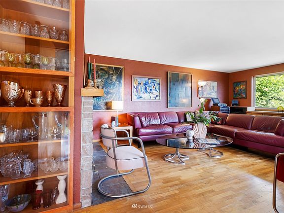 Original hardwoods and tons of bright light welcomes you into this home.>