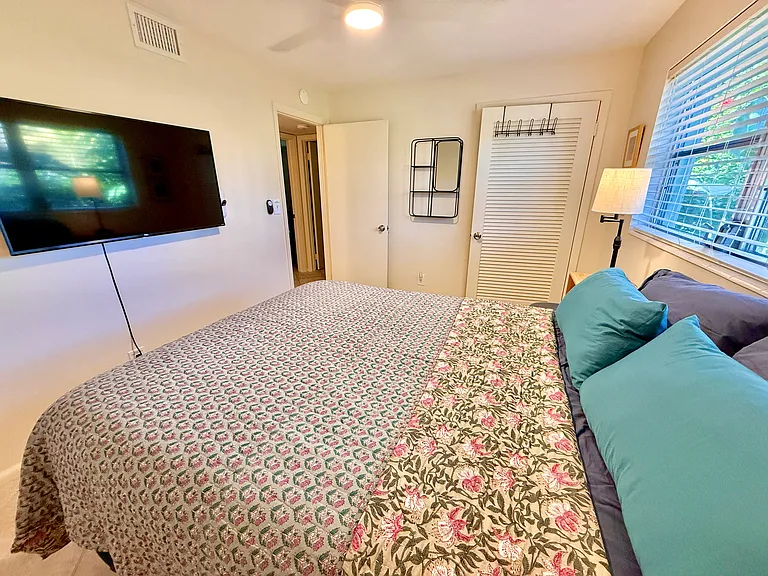 BEDROOM 3 with Queen bed & 50-inch 4K UHD Roku TV.