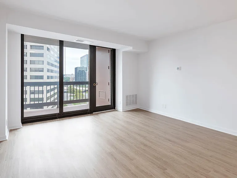 Living Room with Balcony and Hard Surface Flooring