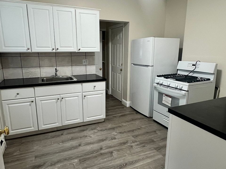 Eat in kitchen with new white cabinets