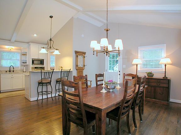 Open kitchen/dining with vaulted ceiling