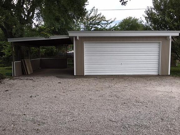 detached garage with carport