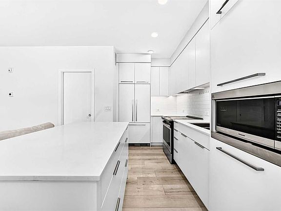 4th image of 3125 E 39th St NW #115