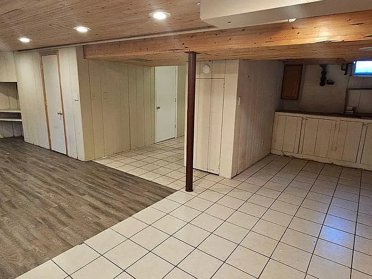 Finished basement and possible bedroom, living room, or game room