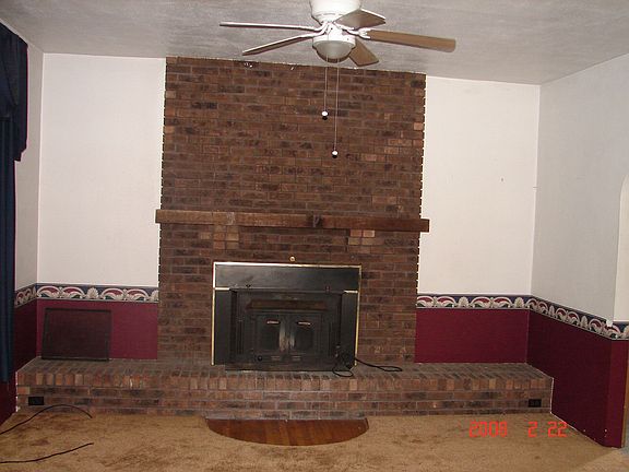 Real wood burning fireplace w/home heating blower