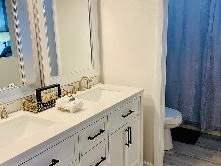 Master Bath with high end Vanity and Marbel top with numerous electrical and USB plugs in the vanity drawers