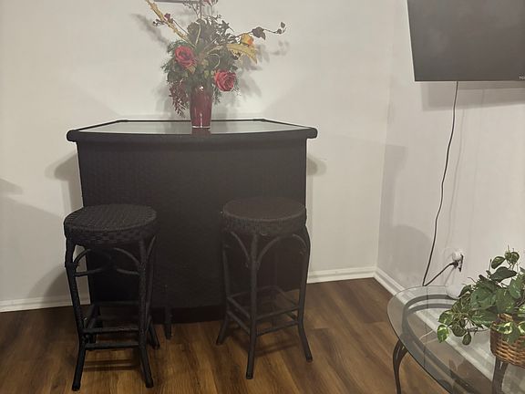 Den, freshly painted with real wood burning fireplace