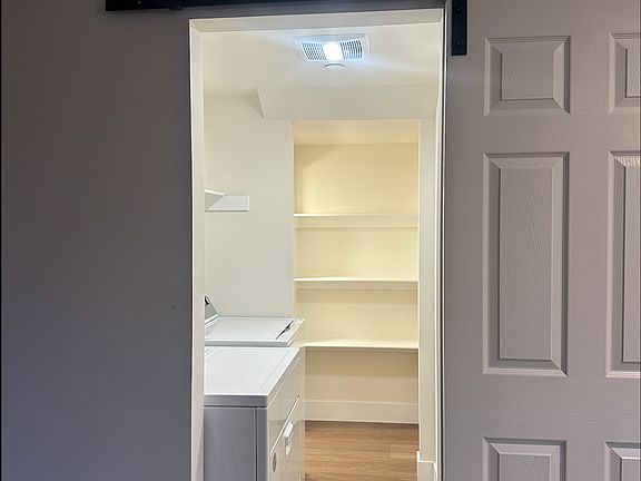 Entrance to laundry and pantry/storage room
