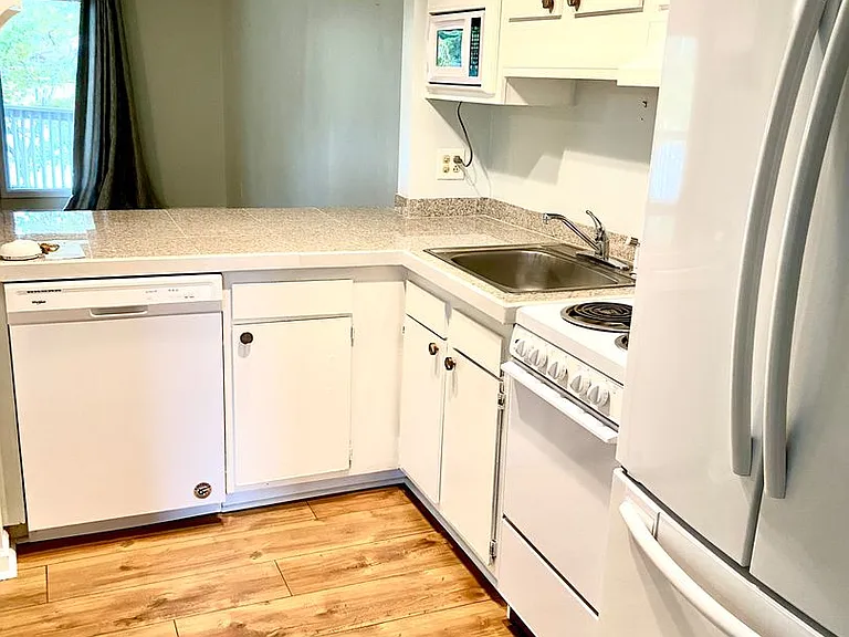 6112 Harbourside Dr — Photo 4