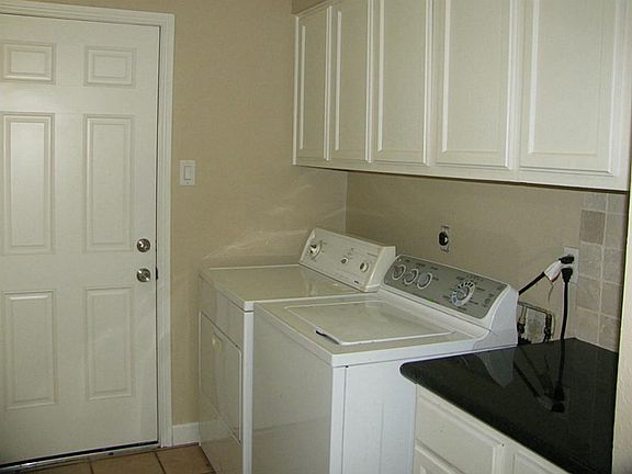 Large inside utility room with folding surface