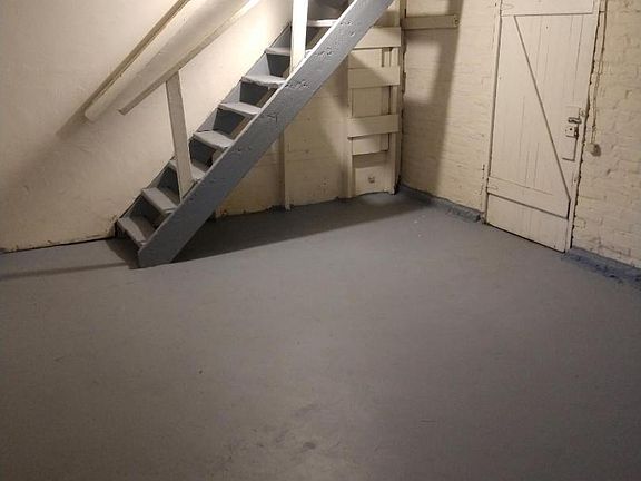 Basement for storage only. No washer/dryer hookups and not a living space.