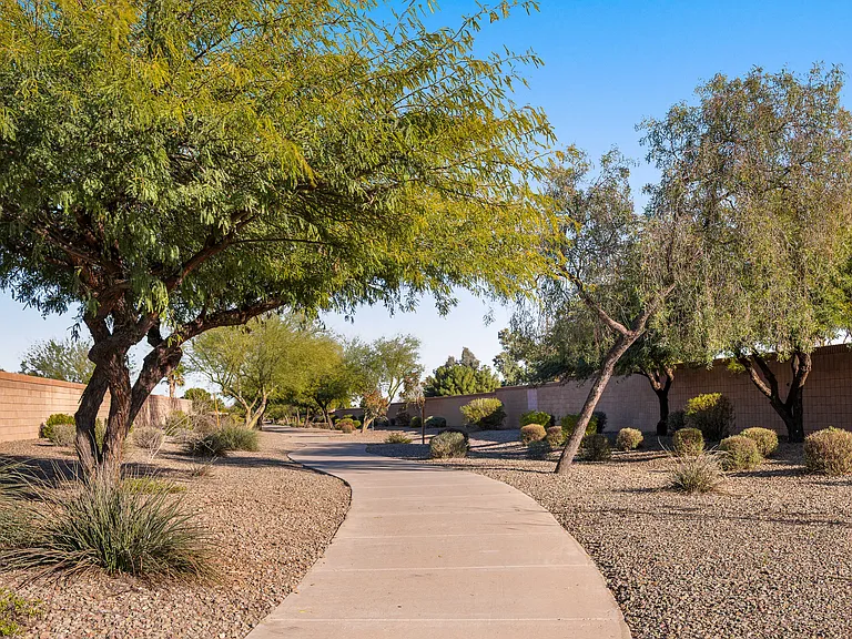 Enjoy peaceful, well-maintained walking paths that wind throughout the community, perfect for morning strolls or evening unwinding. Along the way, you will find nearby play areas, making it easy for kids to stay active while you relax and enjoy the views.