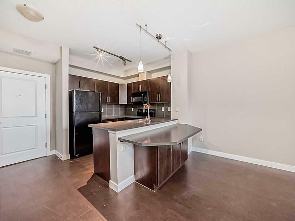 4th image of 113-2727 28th Ave SE #113