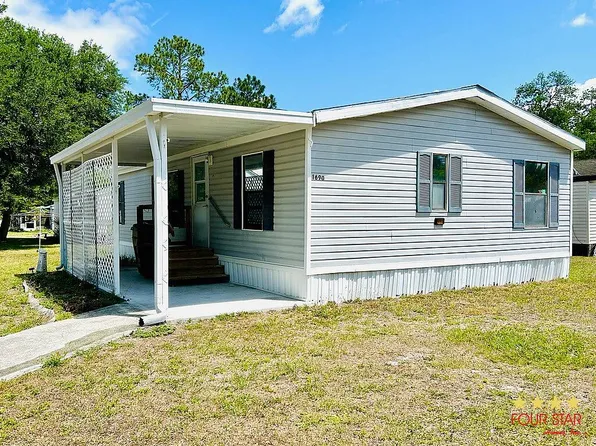 1690 Timber Ridge Cir, Leesburg, FL 34748