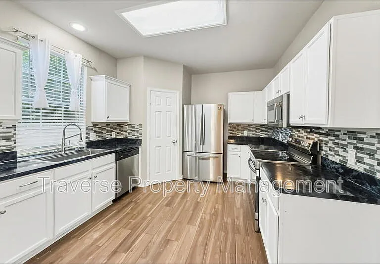 8440 Asheville Ln — Photo 4