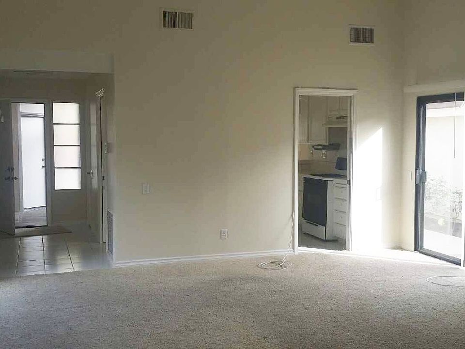 Looking towards entry/kitchen