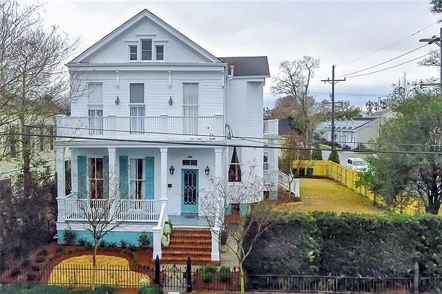 WOW! FABULOUS VICTORIAN WITH HUGE SIDE AND BACK YARD. LOCATED ON CORNER OF DUFOSSAT. FRONT AND SIDE PORCHES AND BALCONIES. 2 OPTIONS FOR OFF STREET PARKING. SIDE AND FRONT.