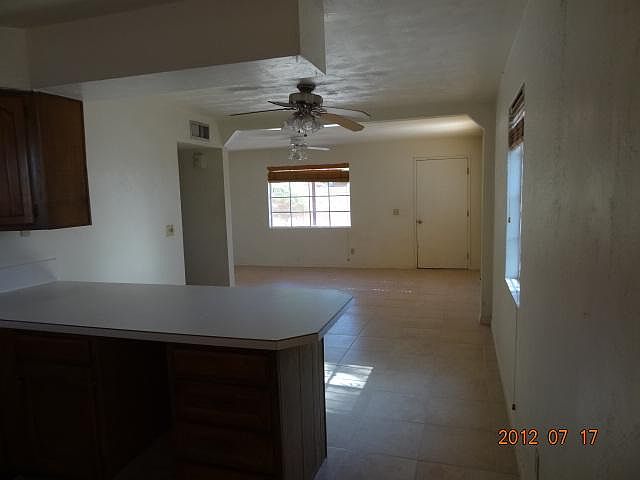 Looking to the front door and living room area