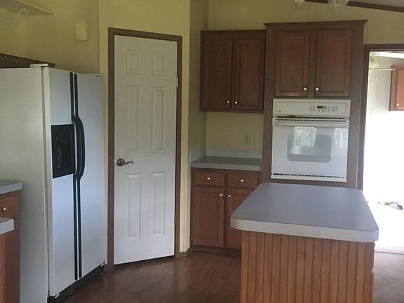 Notice the large pantry.