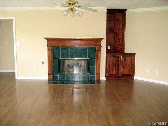Greatroom, as viewed from dining area. To the right is foyer, with, to the left, two guest bedrooms guest bathroom. At left is small hallway to master bedroom, large walk-in closet, master bath suite, with large tub, double sink, separate chamber room