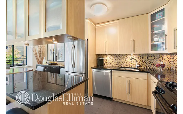 Sold by Douglas Elliman | media 11