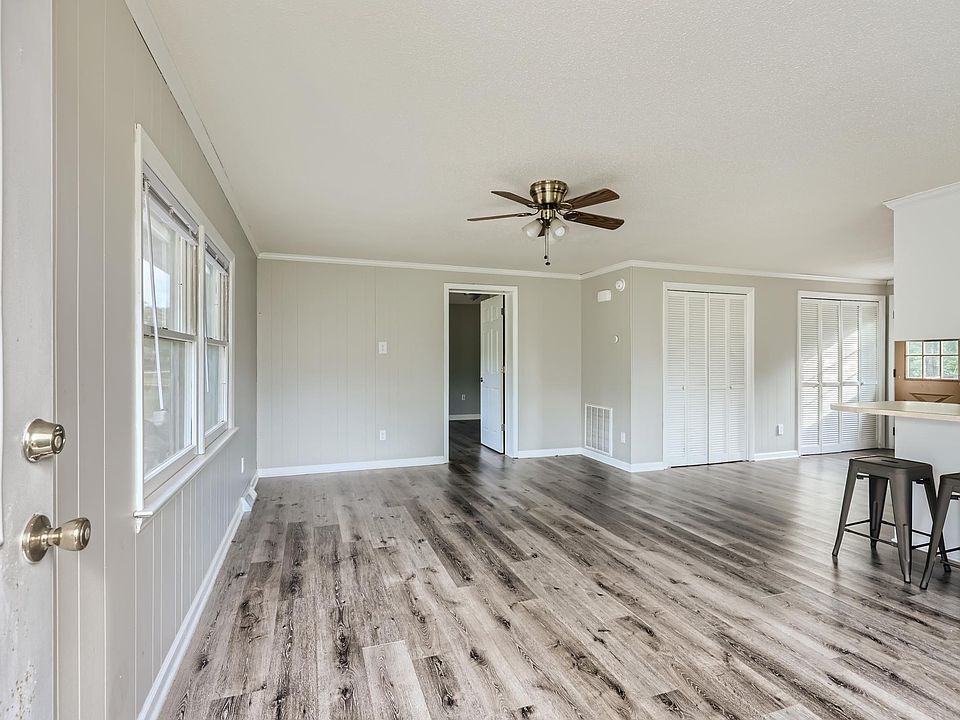 Living room - main entrance behind photo