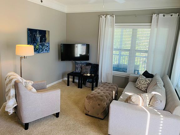 Comfy shared living space while furnished. New tenants welcome to change the direction of the layout and TV location.
