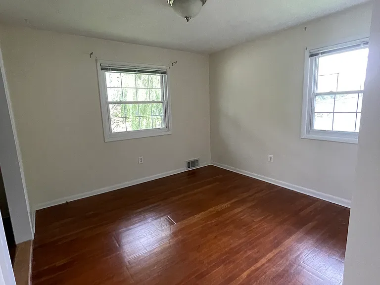 13 x 11 Room @ corner of house. Arch on the left