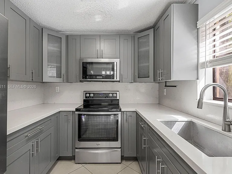 6854 NW 173rd Dr #210 — Photo 12