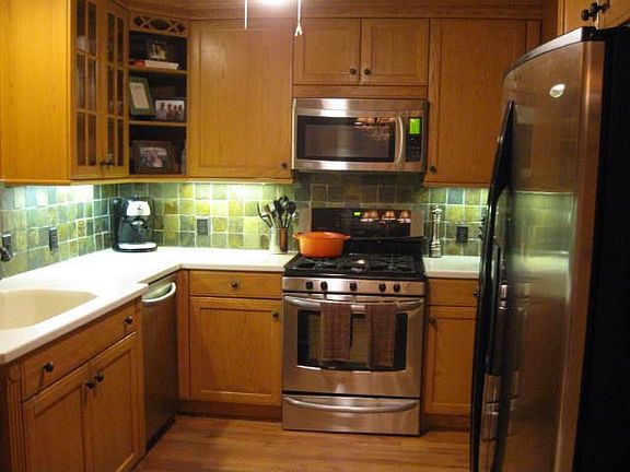 Updated Kitchen Stainless & Corian Tops!