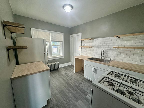 BRAND NEW Kitchen w/ Dishwasher, Subway Tile Backsplash and Butcher Block Counters (dishwasher to be installed)