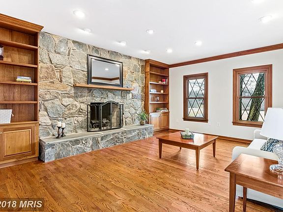 Den/ Library with Built-Ins and Wood Fireplace