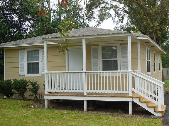 beautiful shady lot with storage building