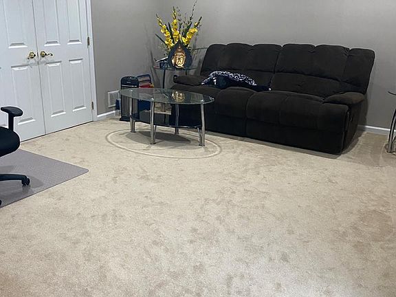 Living room and double doors will let you to Family room